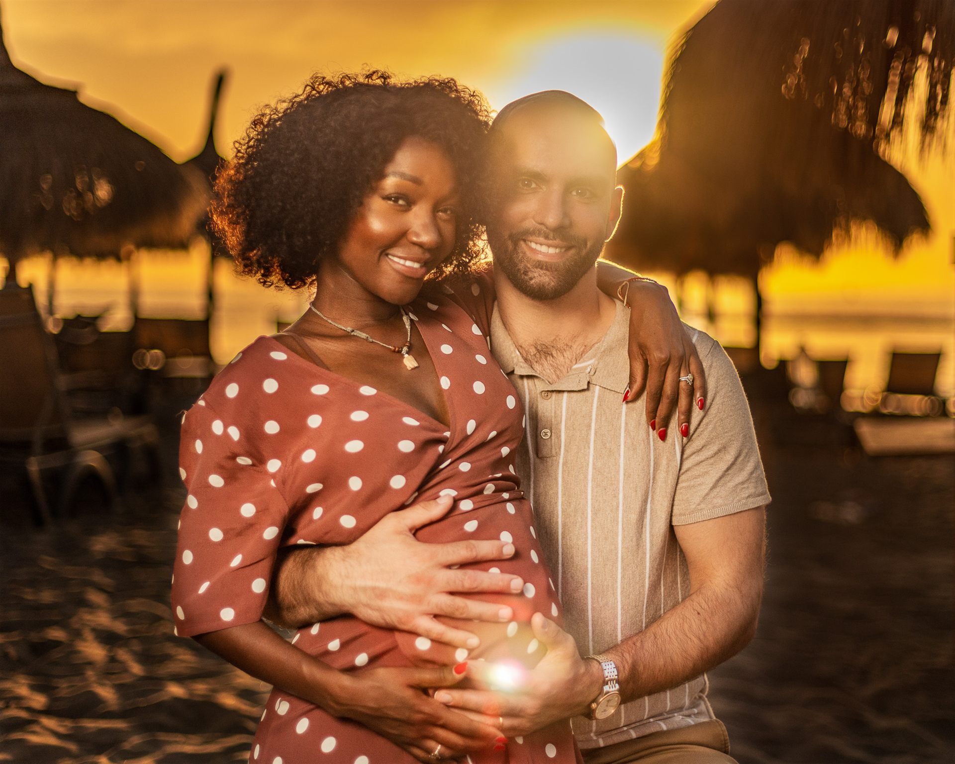 Golden hour babymoon embrace at Playa Fañabé, Costa Adeje