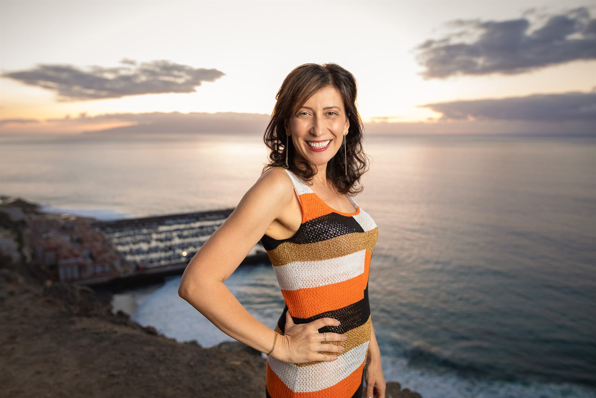 confident solo portrait session at sunset, Los Gigantes marina