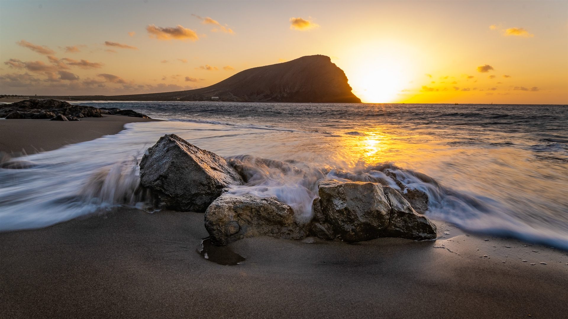 El Médano coastline at sunrise near Montaña Roja (La Tejita)