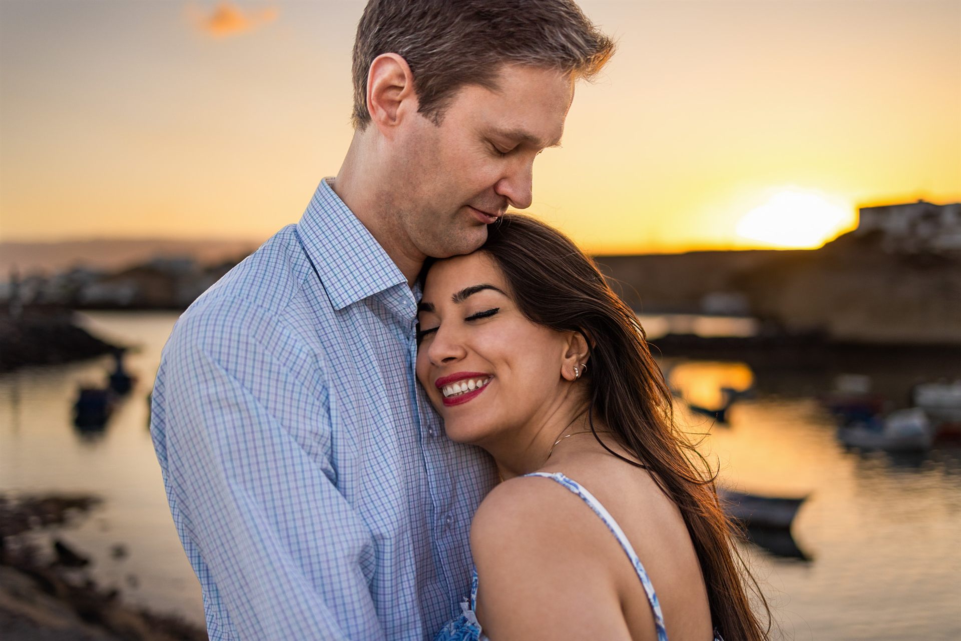 Couple at magic hour by the marina in Tajao