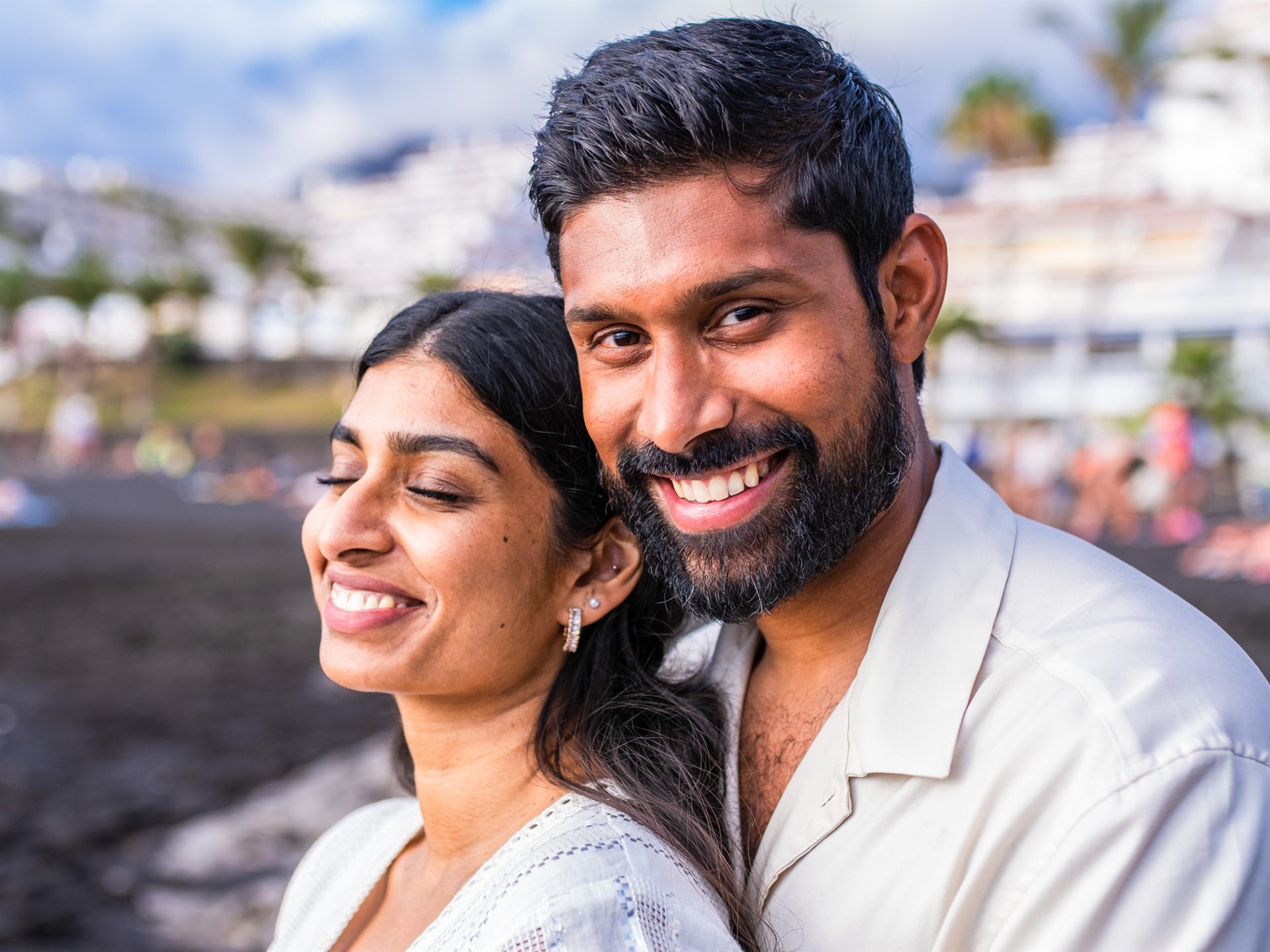 Maternity photo session for a young couple at Playa la Arena