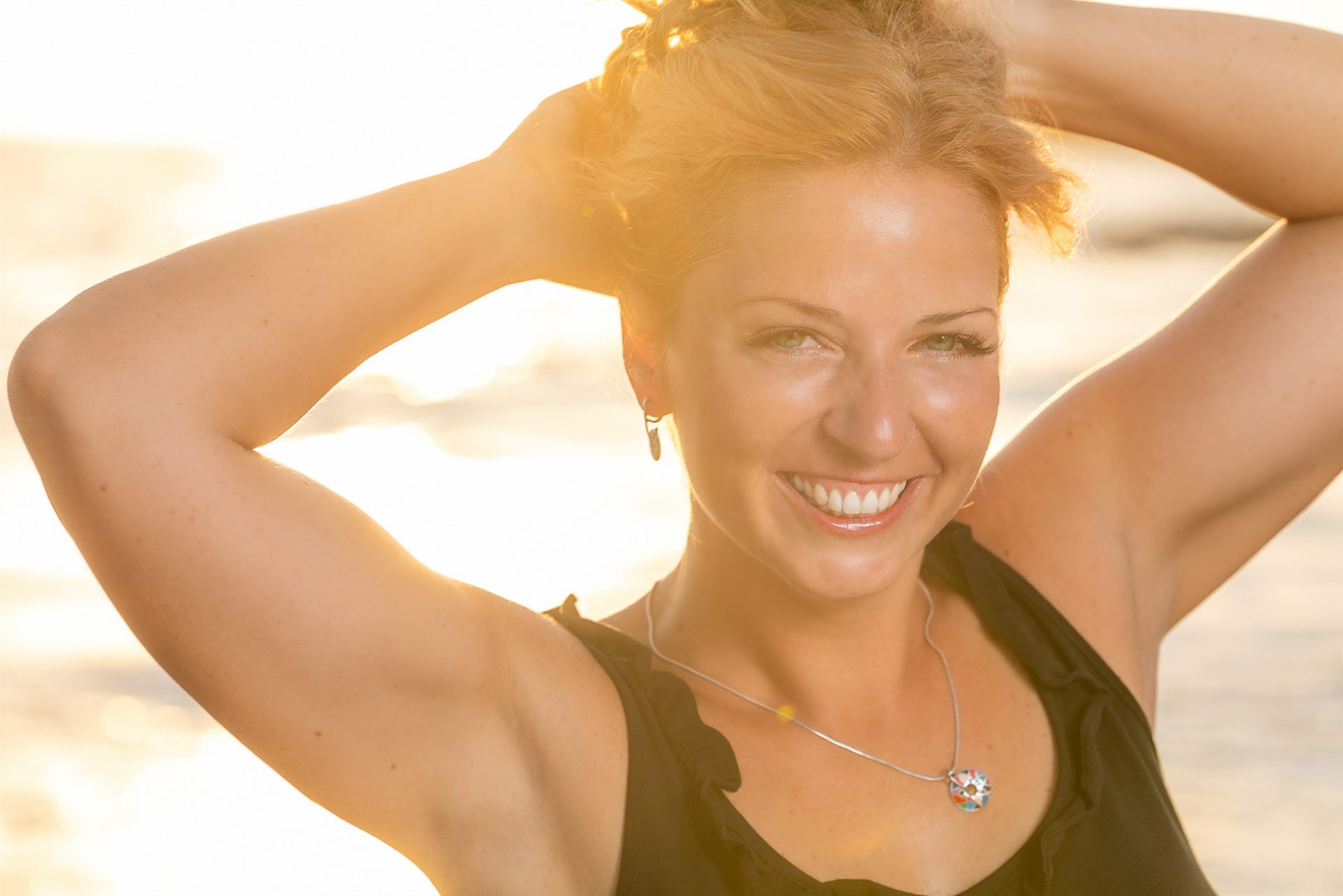 Solo traveler portrait at golden hour on a Costa Adeje beach